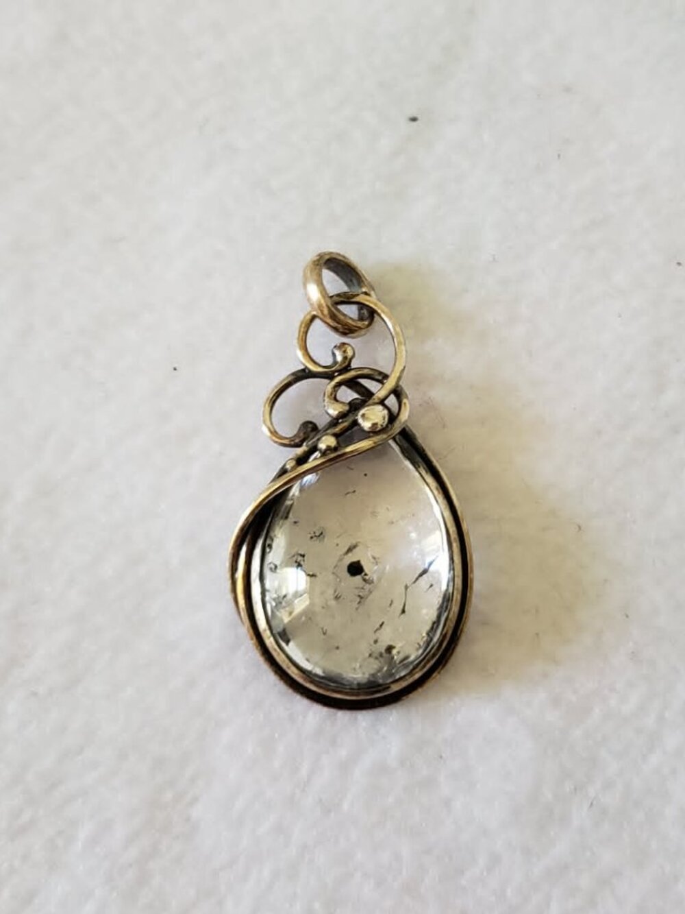 silver and quartz pendant with inclusion